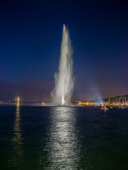 Naklejka na ściany i meble Dramatic night view of the Geneva water jet