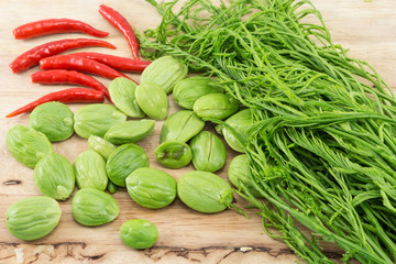Chilli and Parkia speciosa and Acacia pennata close up