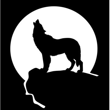 silhouette of a wolf in front of the moon