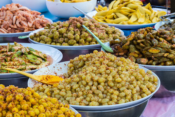 Thai marinated fruits. Street food.