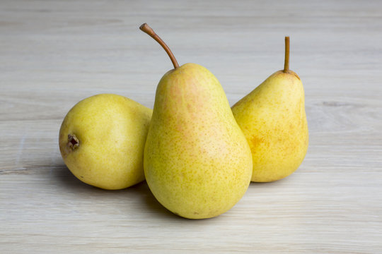 pear lying on a wooden background