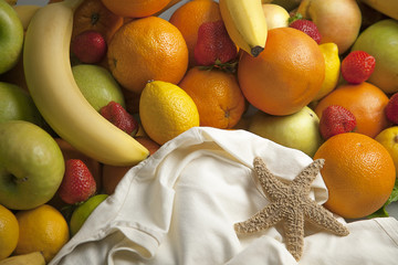 Bunch of fresh fruit with starfish.