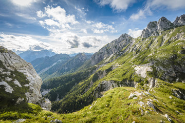 Fototapeta na wymiar Alps mountains tranquil summer view from Mangart peak. Slovenia.