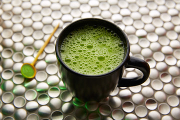 Matcha green tea from Japan on stainless steel