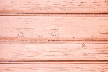 Red paint wooden desks texture.