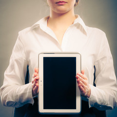 Woman with tablet. Blank screen copy space.