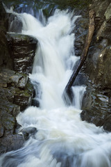 Fototapeta premium Cascade and log, Southford Falls, Southbury, Connecticut.