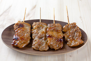 Thai-styled grilled pork. It's among most popular street foods in Thailand.