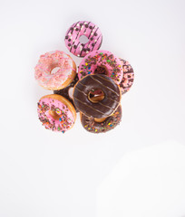 chocolate donuts on a white background