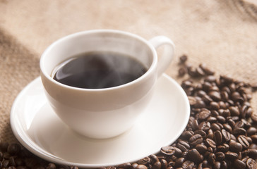 Hot Coffee with gunny-bag background