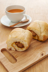 Bread cut sweet with hot milk tea