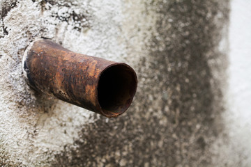 Aged overflow water pipe