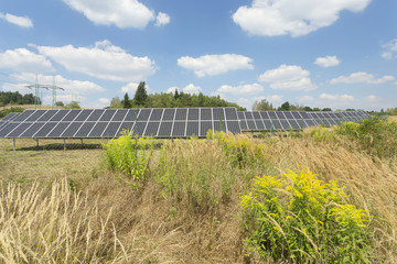 Solar Power Station with cloudy Sky