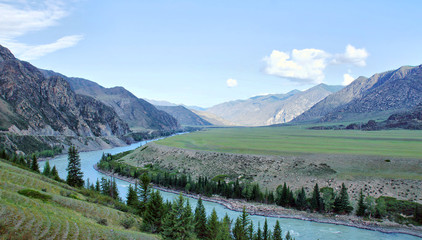 Beautiful landscape with a river flowing among the mountains