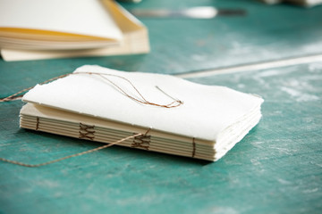 Thread And Papers On Table In Factory