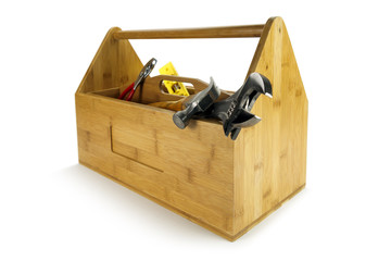 Wooden toolbox with tools isolated on white
