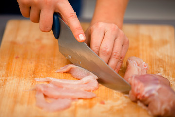 Obraz na płótnie Canvas Cutting meat