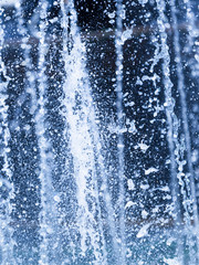 Fototapeta na wymiar Beautiful splashes on a blue background