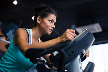 Woman workout on exercises machine