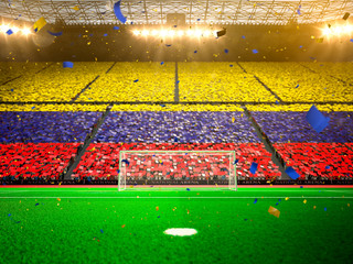 Flag Colombia of fans! Evening stadium arena soccer field championship win! Confetti and tinsel   © A ST