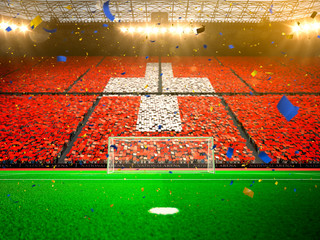 Flag Switzerland  of fans! Evening stadium arena soccer field championship win! Confetti and tinsel   © Anna Stakhiv