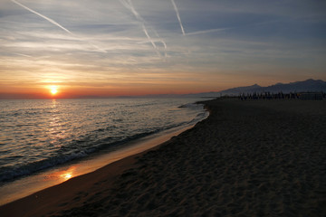 Sunset at the beach of Viareggio Italy