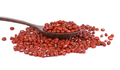 red  beans with a wooden spoon on white background