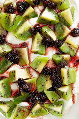 Pavlova with kiwi and berries