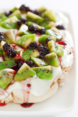 Pavlova with kiwi and berries