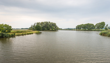 Overlooking a small lake on a cloudy summer day