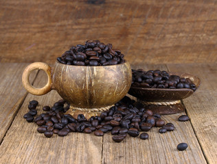 Coffee beans on wooden background
