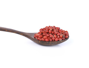 red  beans with a wooden spoon on white background