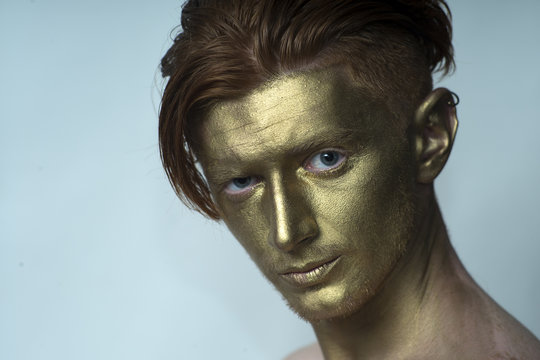 Portrait of golden man