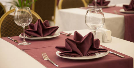 Restaurant table setting with wine glass