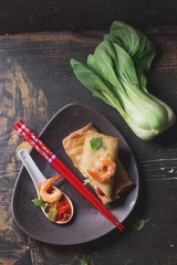 Fried spring rolls with  shrimps, bok choi, chili pepper and hot