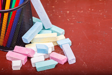 Office cup and heap of chalk