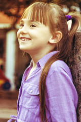 Happy girl with long hair.