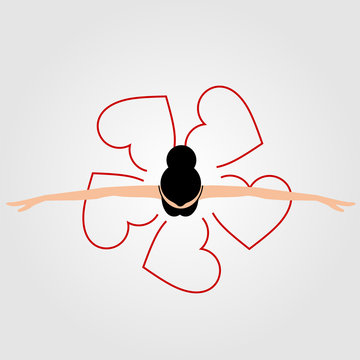 Top view dancing ballerina wearing abstract heart dress