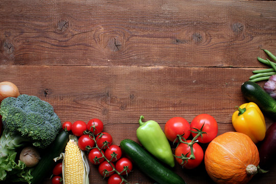 fresh farm vegetables on wooden desk