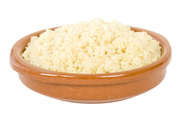 Couscous - Moroccan lemon couscous in a terracotta bowl.
