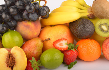 Assortment of exotic fruits isolated on white