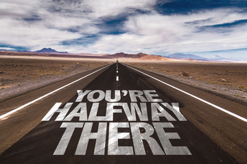 You're Halfway There written on desert road