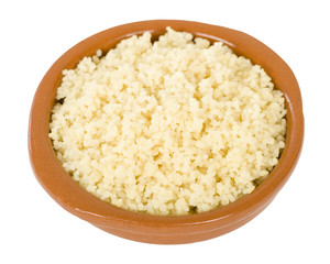 Couscous - Moroccan lemon couscous in a terracotta bowl.
