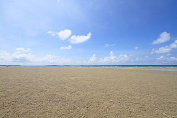 Beach and tropical sea with blue sky and cloud
