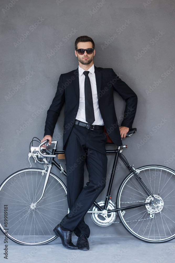 Poster businessman with his bicycle.