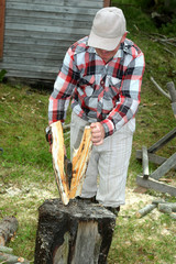 man chopping wood