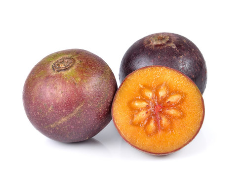 Flacourtia fruit on white background