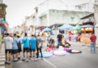 Blurred people on the street in phuket old town
