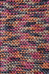 Fototapeta premium Length of knitting in multi-coloured yarn