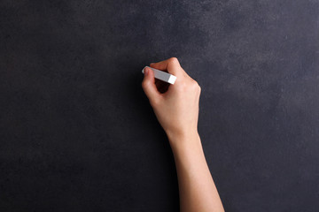 black board and hand